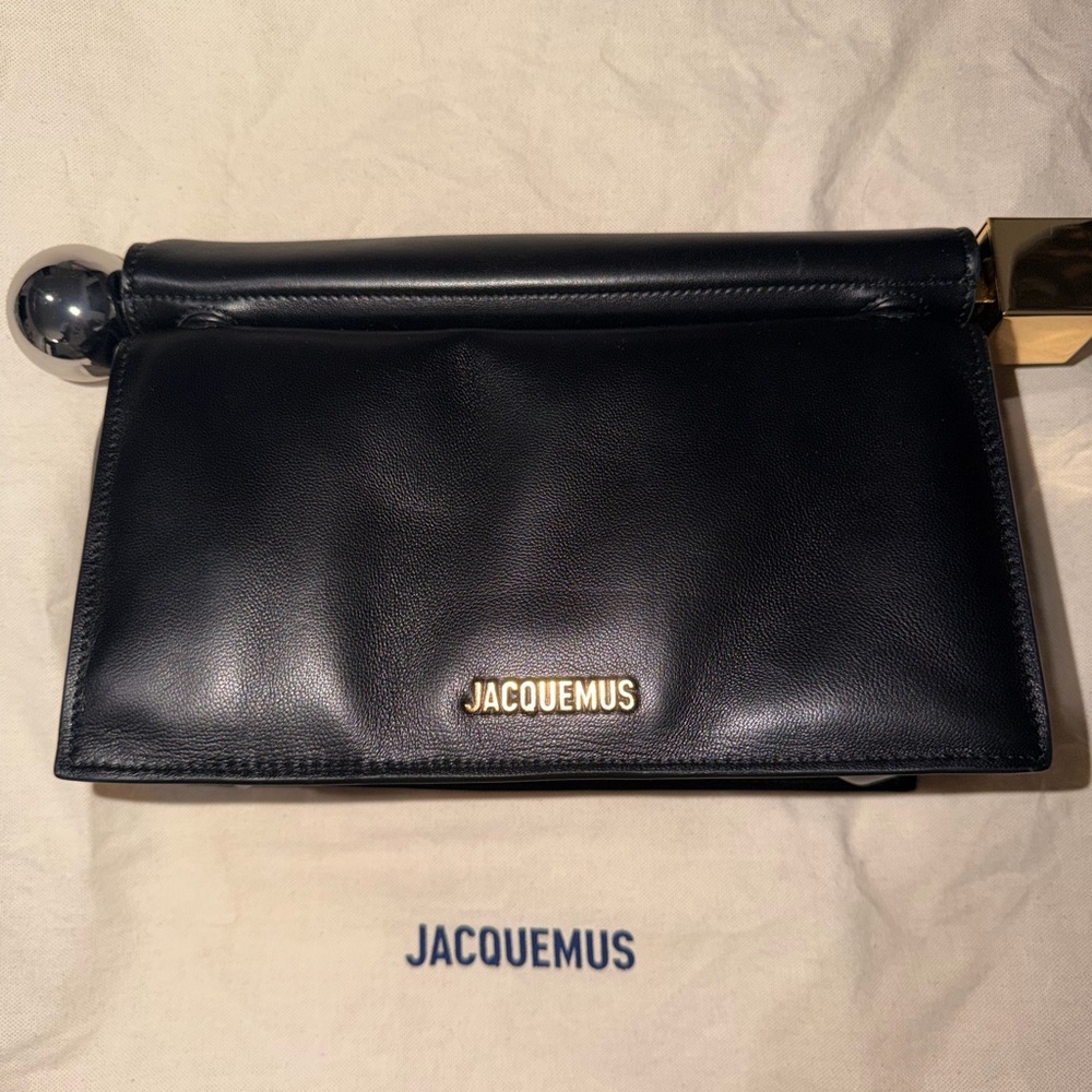 Jacquemus Black Leather Clutch Bag with Gold Accent
